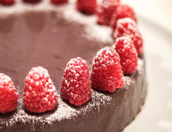 close up of Torta with raspberries.