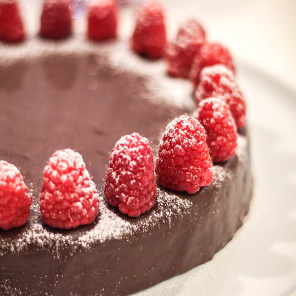 close up of Torta with raspberries.