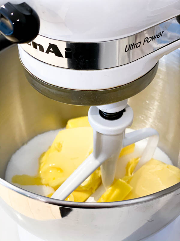 The butter and sugar inside the bowl of the Kitchenaid Stand Mixer ready to be beaten together.