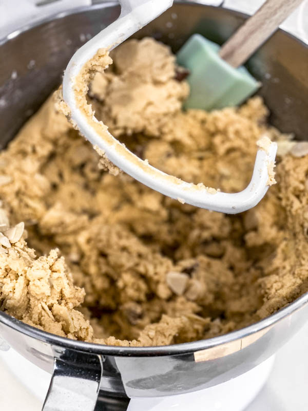 The Gingernut Biscuit dough in a cake mixer bowl with dough hook attachment. The dough is now ready to rest in the fridge before rolling into balls.