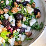 A close up of the salad showing all the ingredients with rocket leaves (arugula).