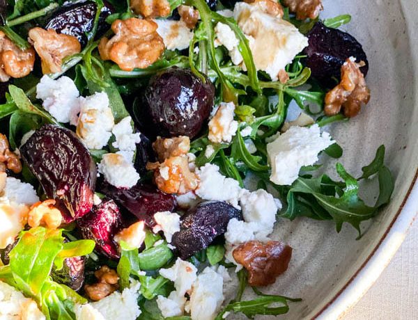 A close up of the salad showing all the ingredients with rocket leaves (arugula).