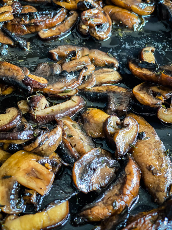 The mushrooms are now roasted and glossy on the oven tray.