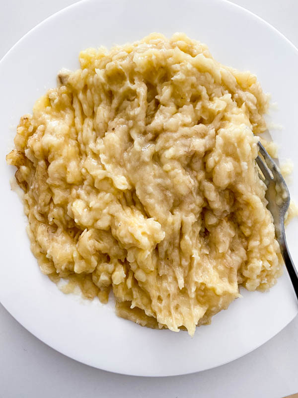 Mashed bananas on a plate.