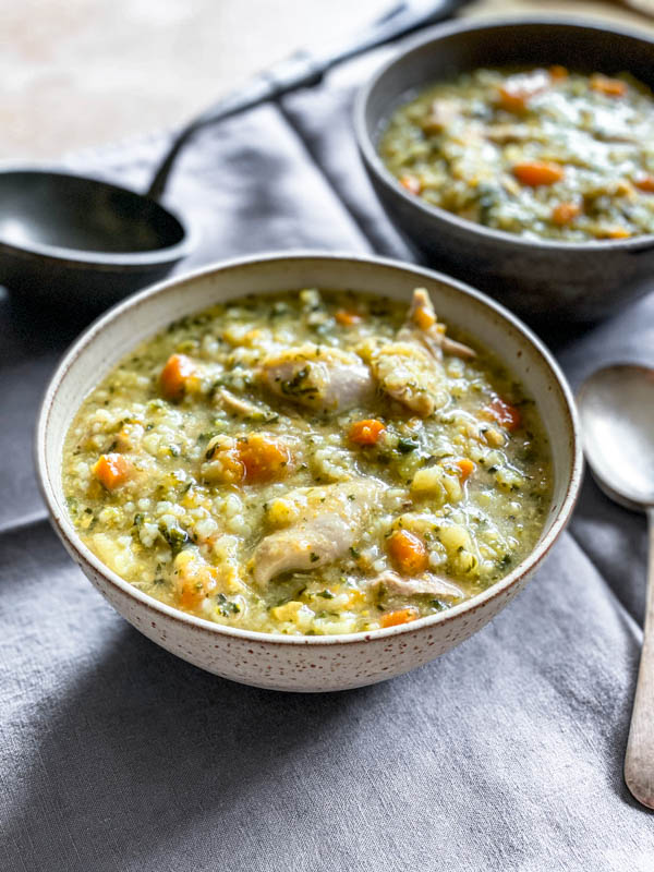 A close up of the Chicken, Rice and Vegetable Soup in bowls ready to be eaten.