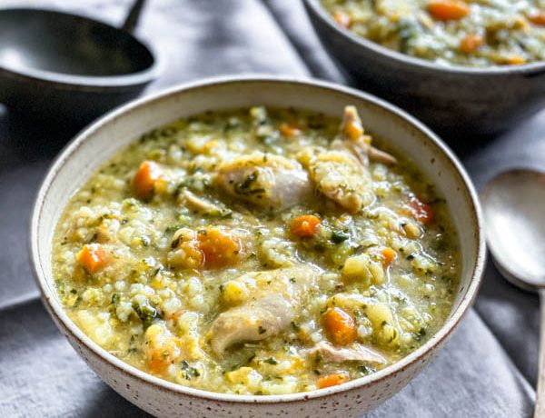 The soup is in bowls on a table ready to be served.