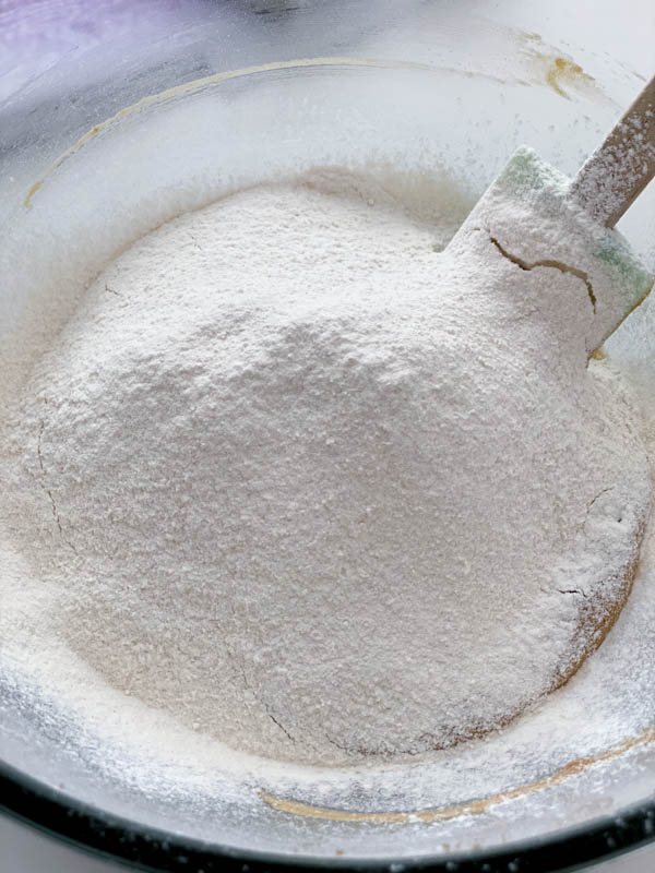 The sifted flour is added to the wet ingredients.