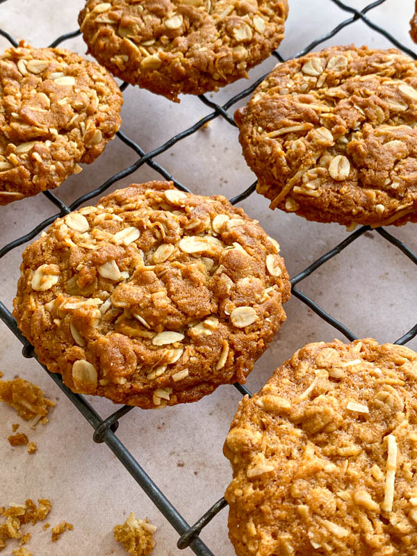 A side on view of the biscuits cooling on a wire rack.