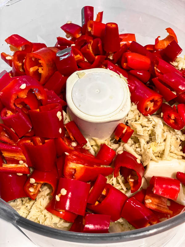 The roughly chopped chillies are now added to the food processor bowl.