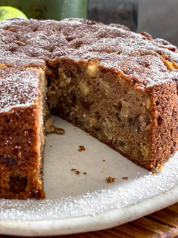 A close up of the cake which has had a slice removed. You can see the interior crumb.