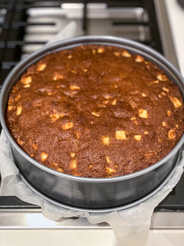 The cake is now baked and resting in the cake tin.