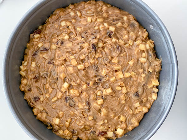 The cake batter is in the pan and ready to be placed in the oven.