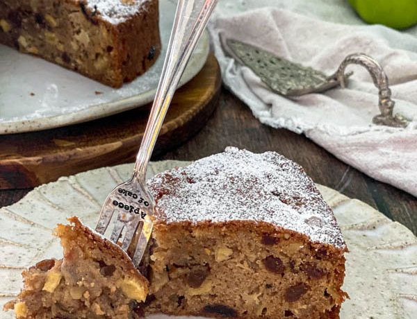 A close up of a slice of the apple cake.