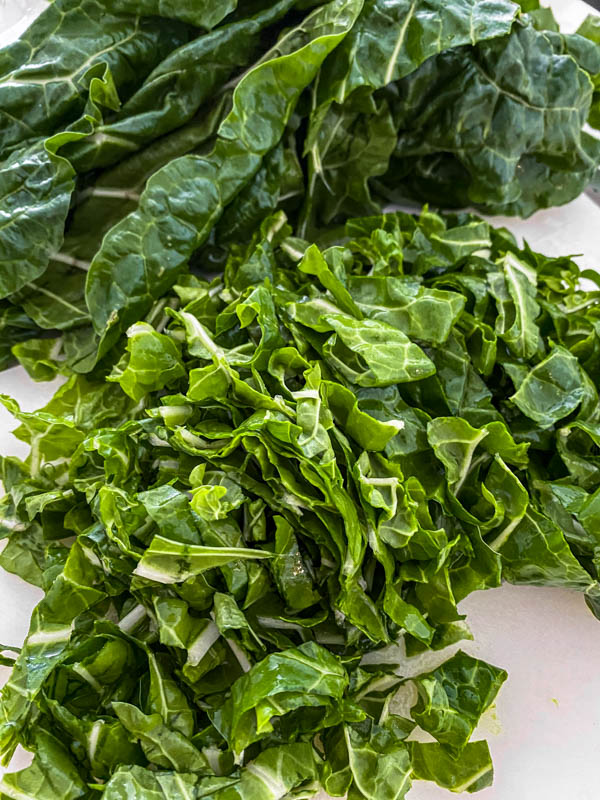 Some of the silverbeet leaves have been cut into 1cm strips and then chopped up.