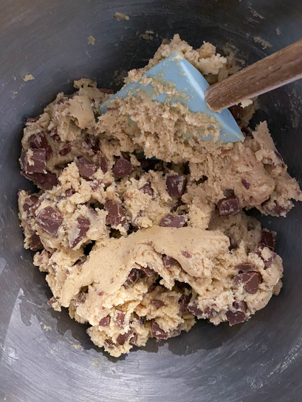 The chocolate chunks are now added to the cookie dough and ready to be refrigerated for 30 minutes.