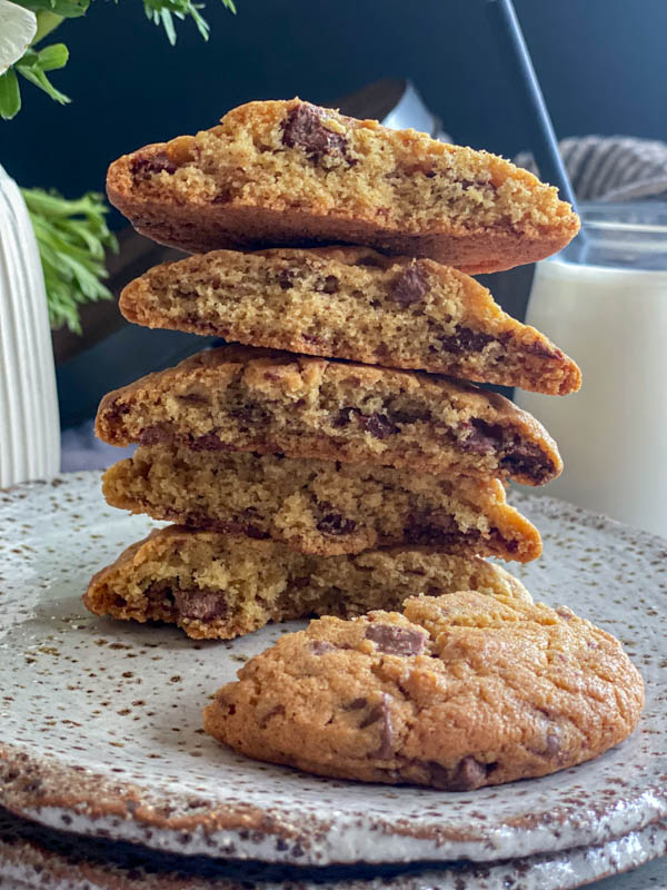 A close-up of the halved cookies showing the crumb and all the chocolate chunks inside.