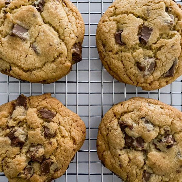 Looking down onto the golden chocolate chip cookies that are loaded with chocolate chunks.