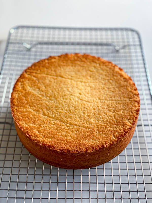 The cake is now turned out onto a wire cooling rack to continue cooling.