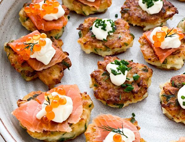 A close up of the fritters with toppings ready to be served.