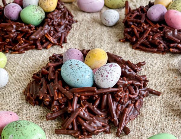 A close up of the Easter Chocolate Nests filled with colourful mini easter eggs.