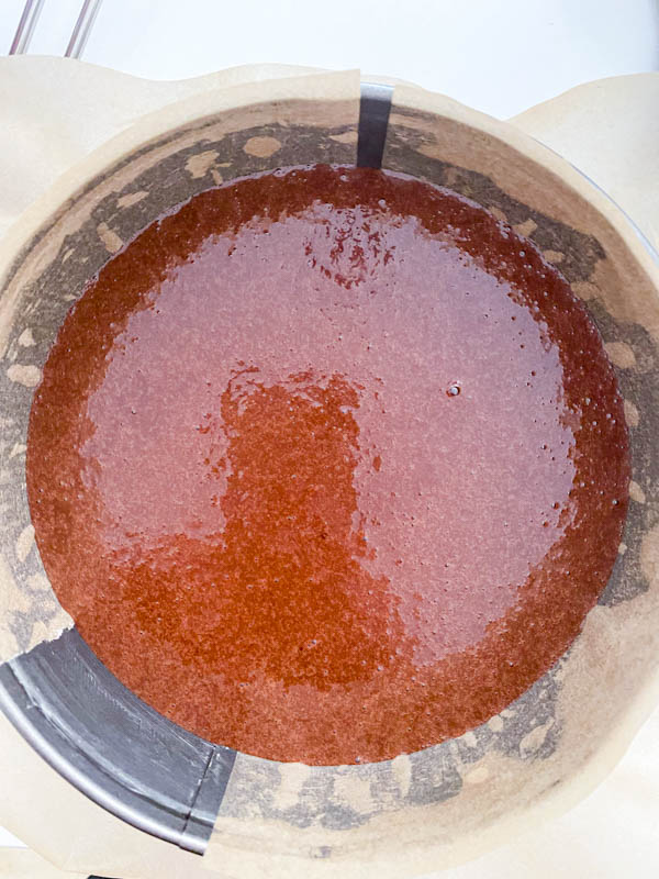 The cake batter has now been poured into the lined baking tin ready to be baked in the oven.