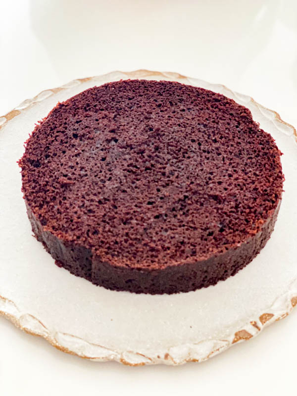 The cooled cake has been trimmed on top to produce a flat finish.