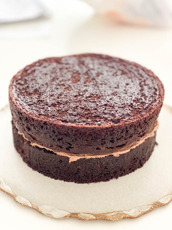 The second layer of chocolate cake is now added to the cake.