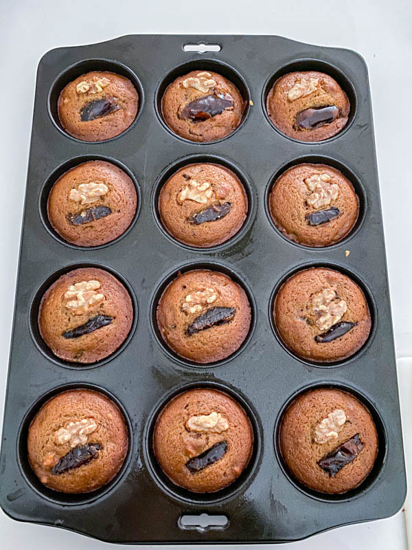 The muffins are now baked and resting in the muffin tray until cooled slightly.