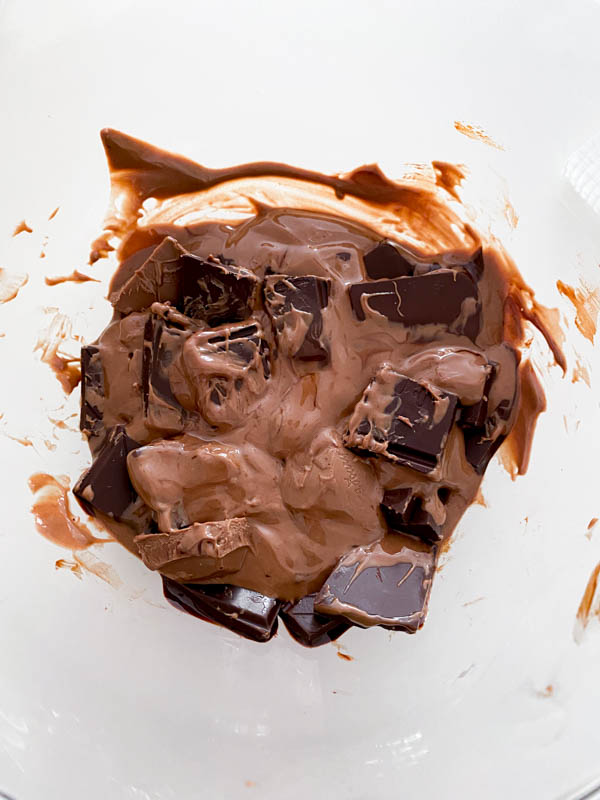 Looking down into a bowl of partially melted chocolate. Here I have used a 50/50 mix of milk and dark chocolate.